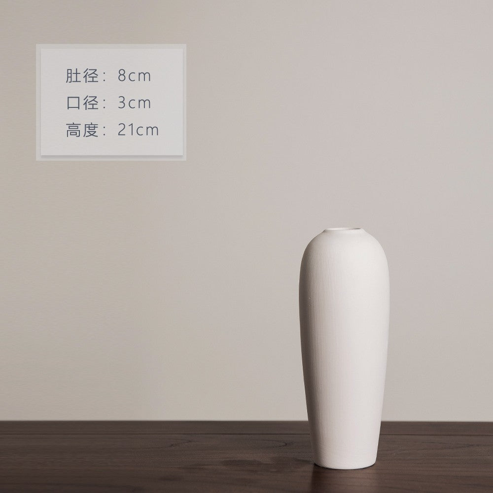 Matte ivory tall capsule-shaped ceramic vase, 21 cm high
