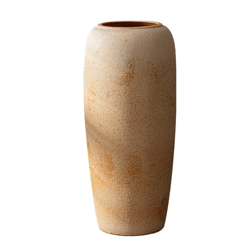 Beige sand-texture ceramic floor vase isolated on white
