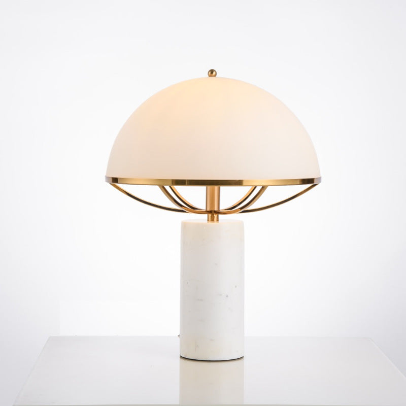 White marble mushroom dome table lamp with gold tone cage frame and opal shade