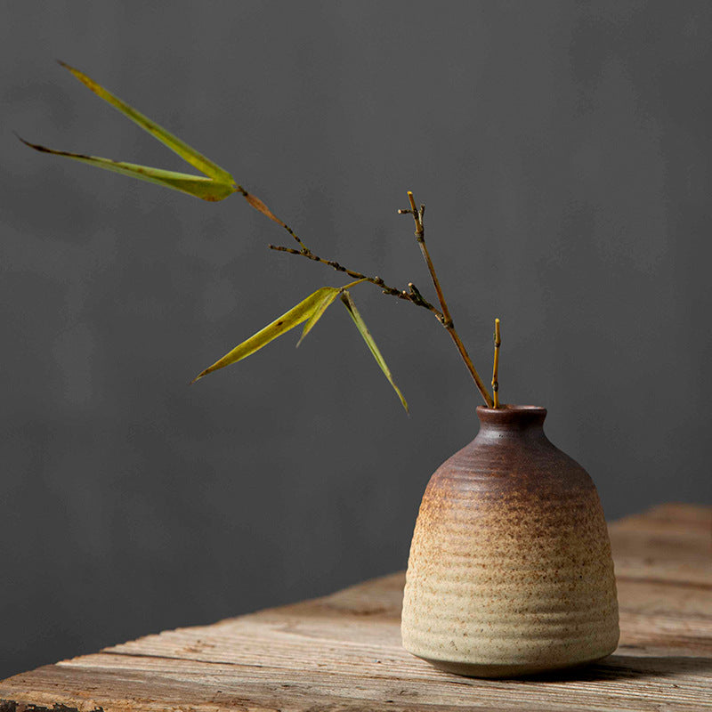 Ribbed pear-shape brown-to-cream mini ceramic vase with bamboo stem