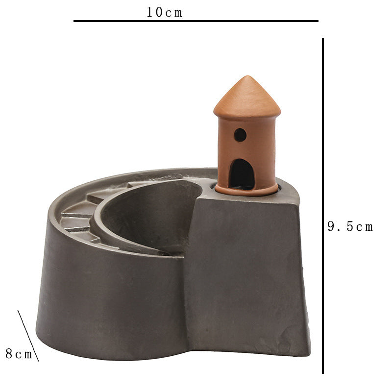 Ceramic backflow incense burner with spiral smoke path and tower detail