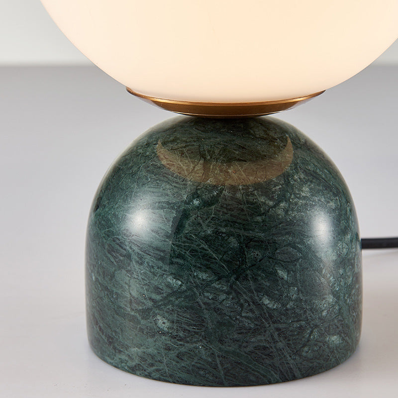 Green marble base globe table lamp close detail