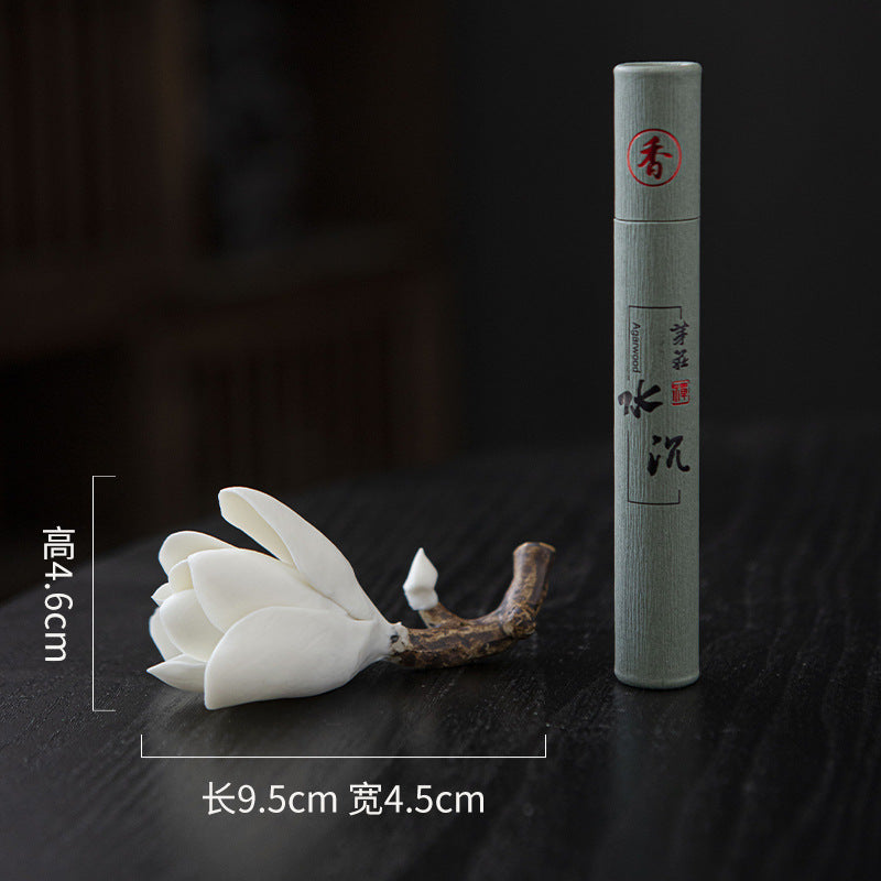 White magnolia incense holder paired with Nha Trang sinking agarwood incense