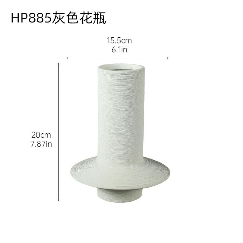 Light grey textured ceramic vase with disc base, 20 cm high and 15.5 cm wide