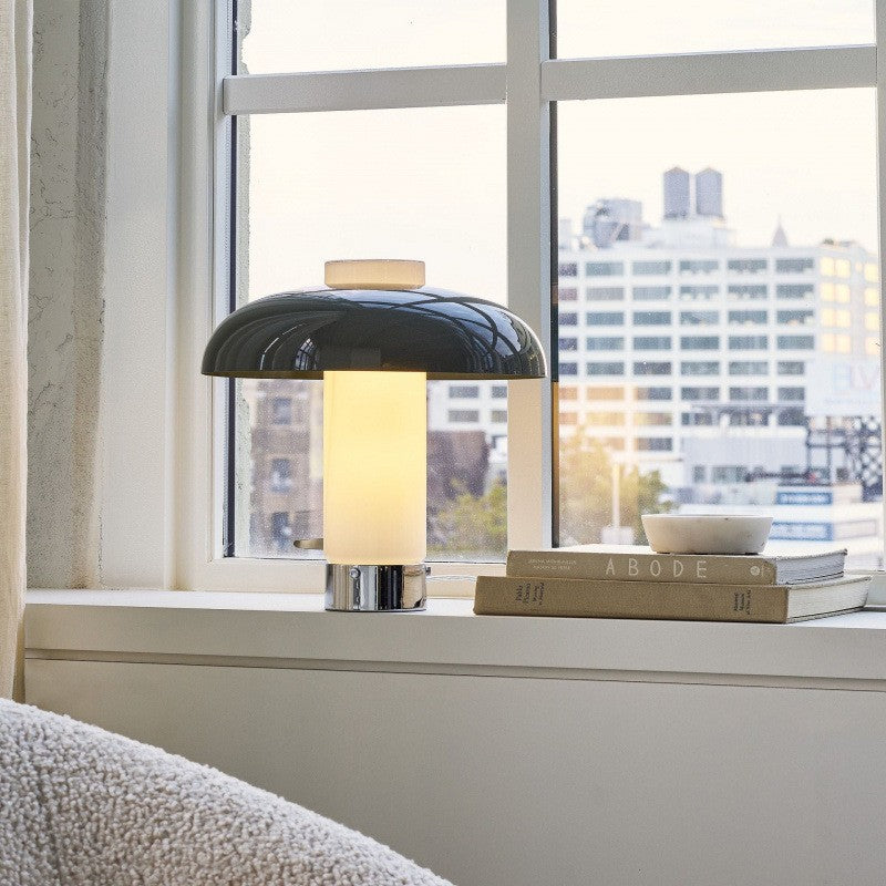 Green sculptural dome table lamp styled in modern interior
