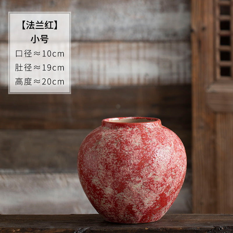 Small rounded berry red textured ceramic vase 20 cm high