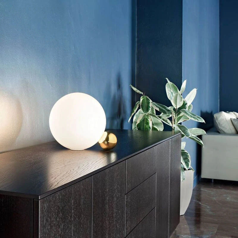 30cm sculptural opal globe table lamp styled on dark wood sideboard