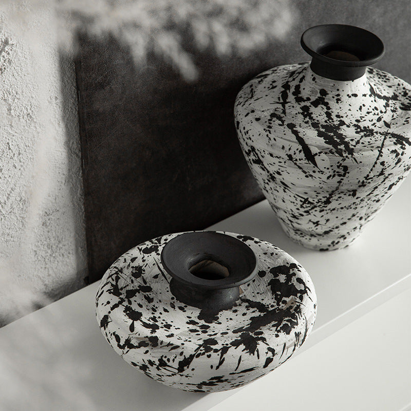 Black and white abstract splatter ceramic vases viewed from above