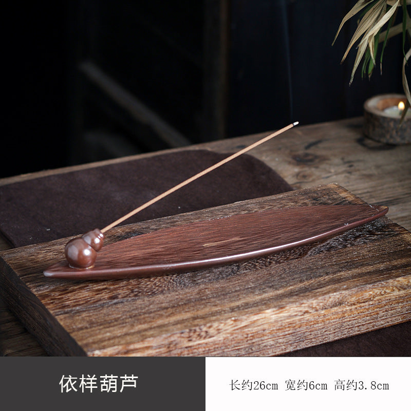 Brown gourd leaf ceramic incense tray approximately 26 cm long