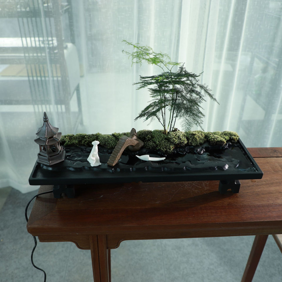 Long black stone water garden with ornamental tree scholar figure moss and miniature landscape decor