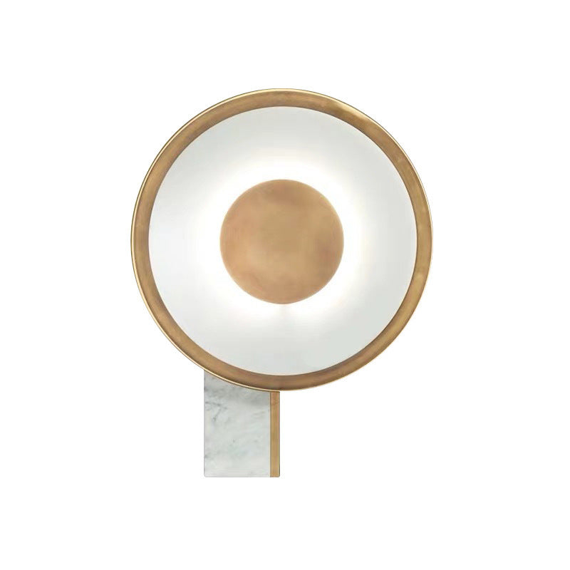 Halo ring table lamp with gold frame and luminous acrylic diffuser