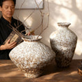 Weathered white brown rustic ceramic vases with New Chinese branch arrangement