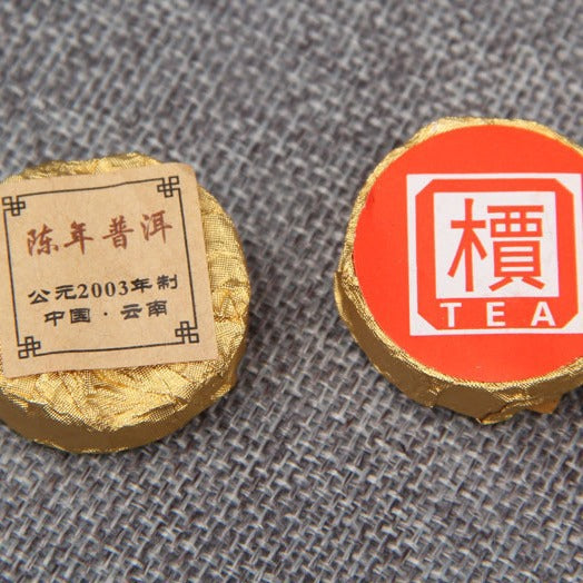 Aged ripe Pu-erh mini tuocha brewed tea 2003 Yunnan shou puer