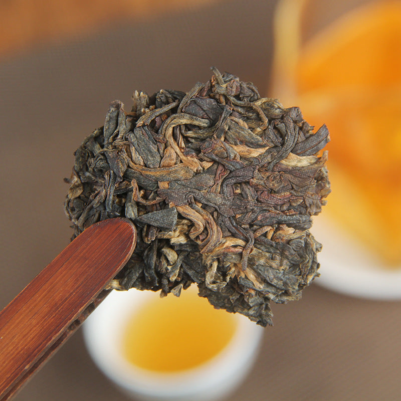 Close-up of loosened leaves from 2006 Puwen Yunya raw Pu-erh tea cake