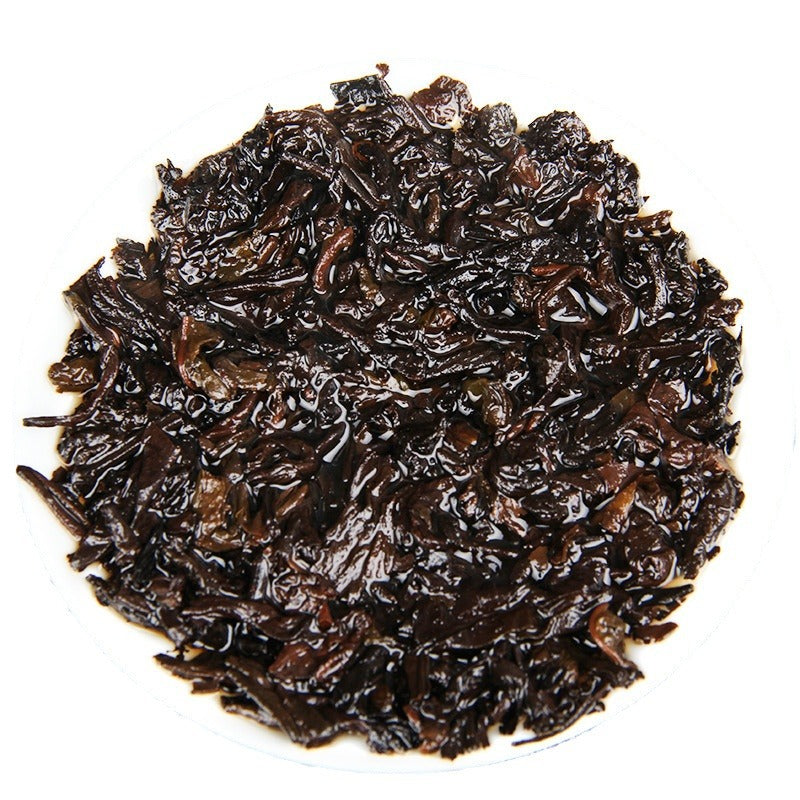 Brewed leaves from 2013 material 2017 pressed Menghai ripe Pu-erh tea cake