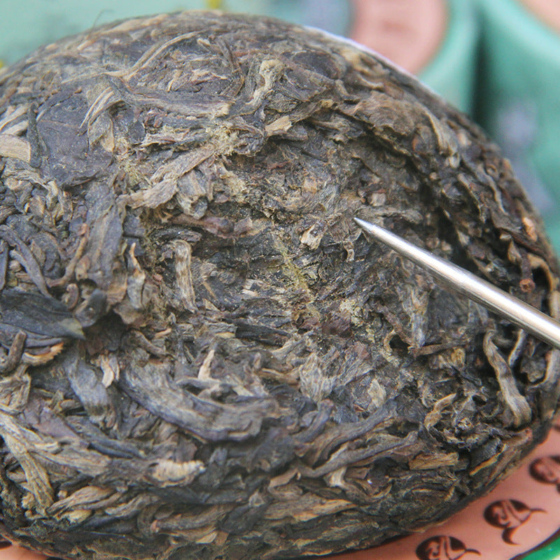 2013 Yinhao raw Pu-erh compressed tuo detail
