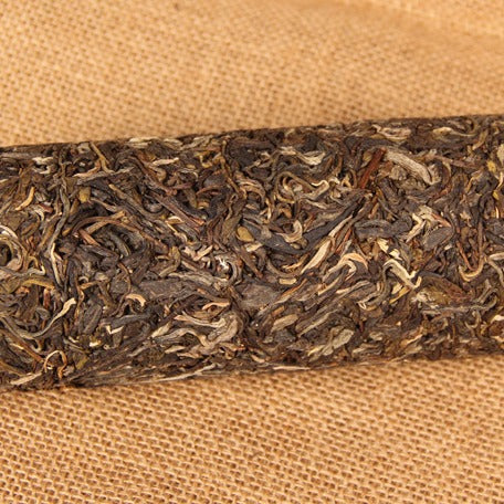 Bingdao ancient-tree raw Pu-erh bamboo tube detail