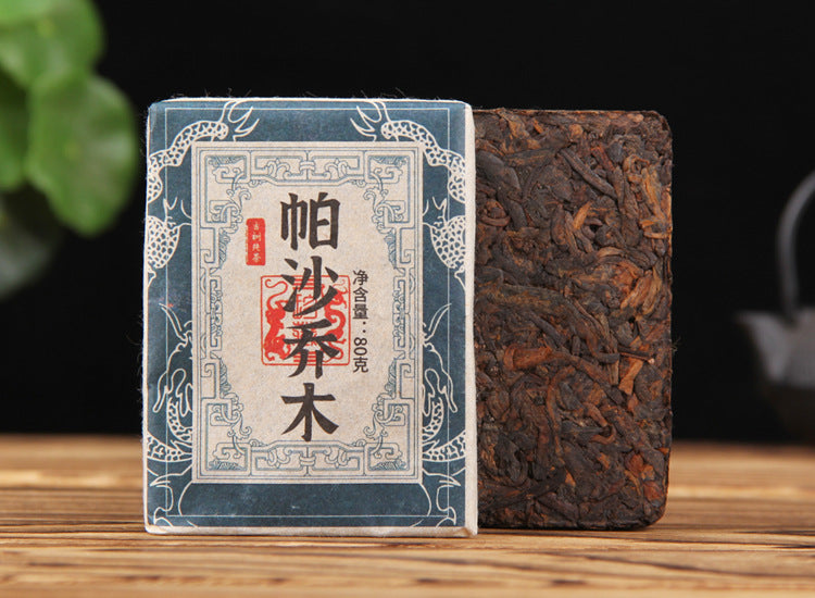 Pasha Qiaomu ripe Pu-erh compact tea brick presentation