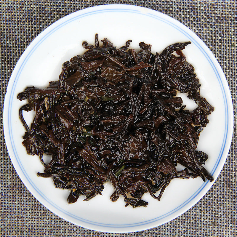 Brewed leaves from 2016 sticky rice aroma ripe Pu-erh with Nuo Mi Xiang botanical fragrance