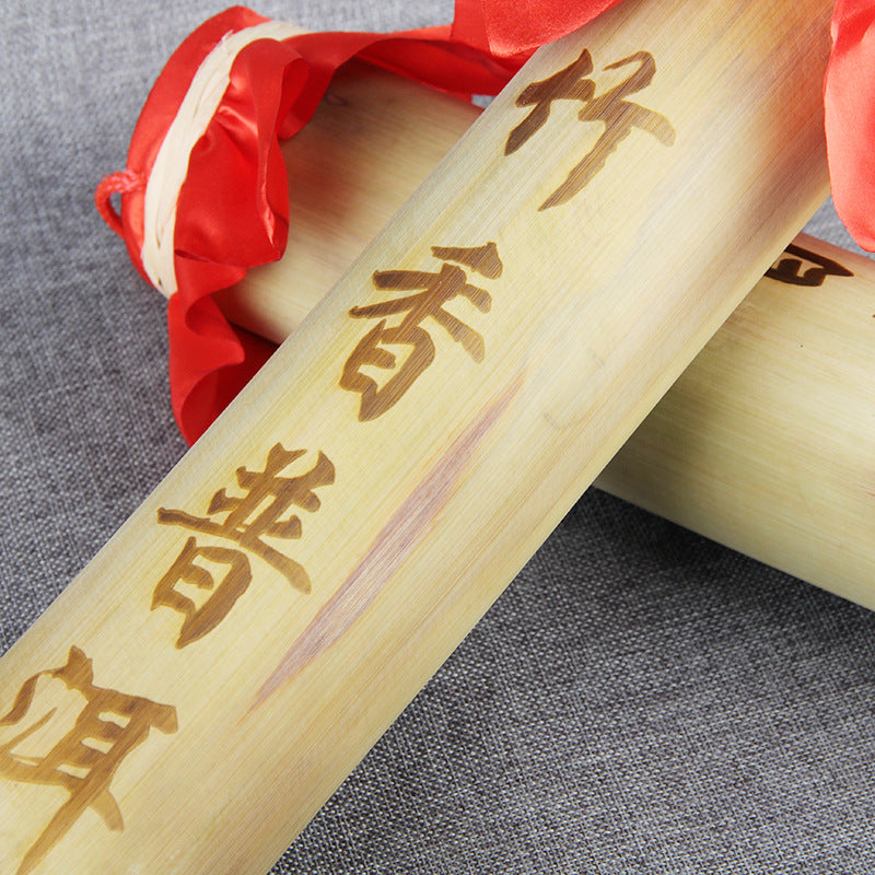 Menghai ancient-tree ripe Pu-erh bamboo tube detail