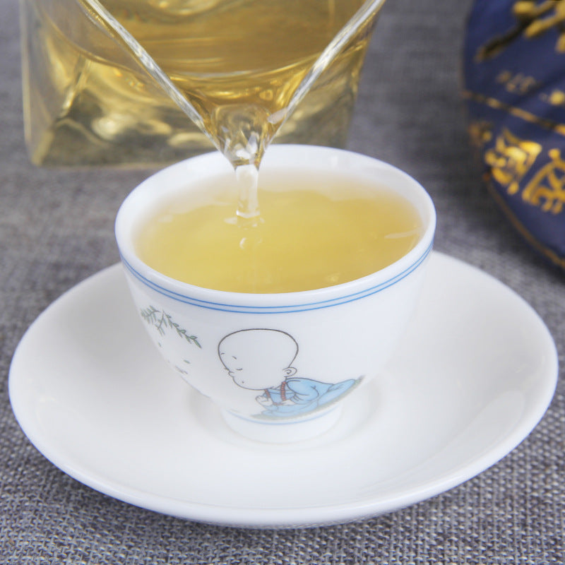 Bright golden liquor brewed from 2019 Heritage Seal raw Pu-erh