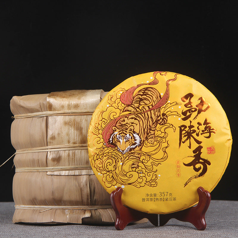 2019 Menghai aged-aroma ripe Pu-erh 357g tea cake with traditional bamboo tong packaging
