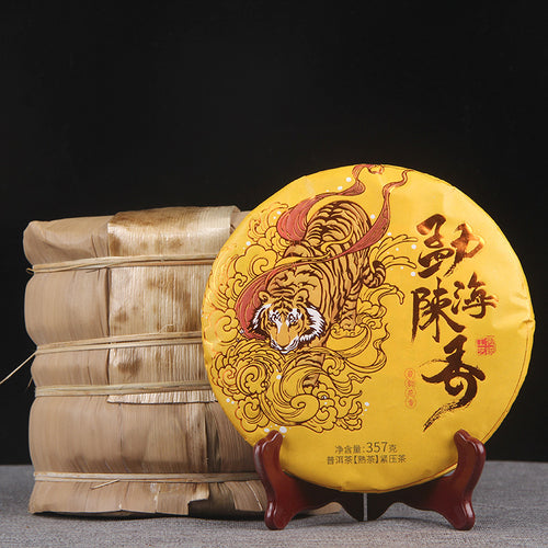 2019 Menghai aged-aroma ripe Pu-erh 357g tea cake with traditional bamboo tong packaging