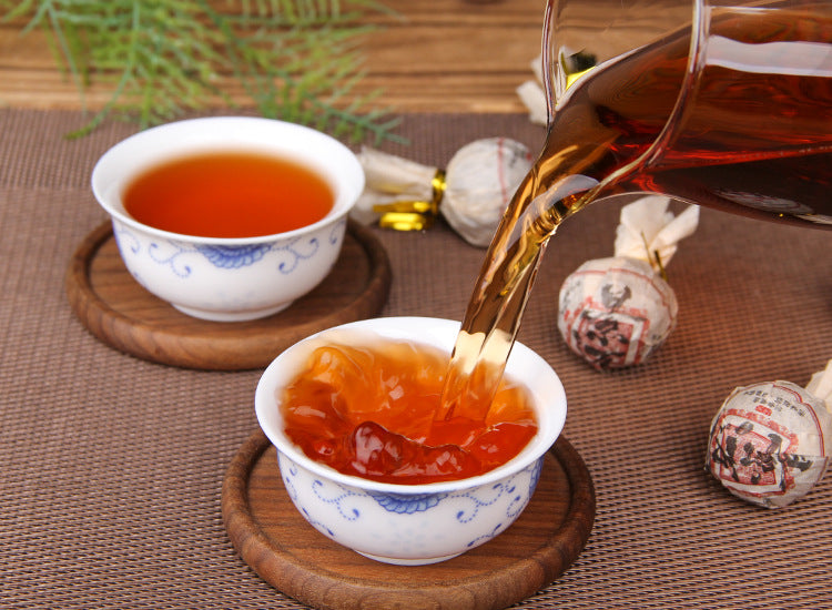 Jingmai ripe Pu-erh dragon pearl compressed tea leaf detail