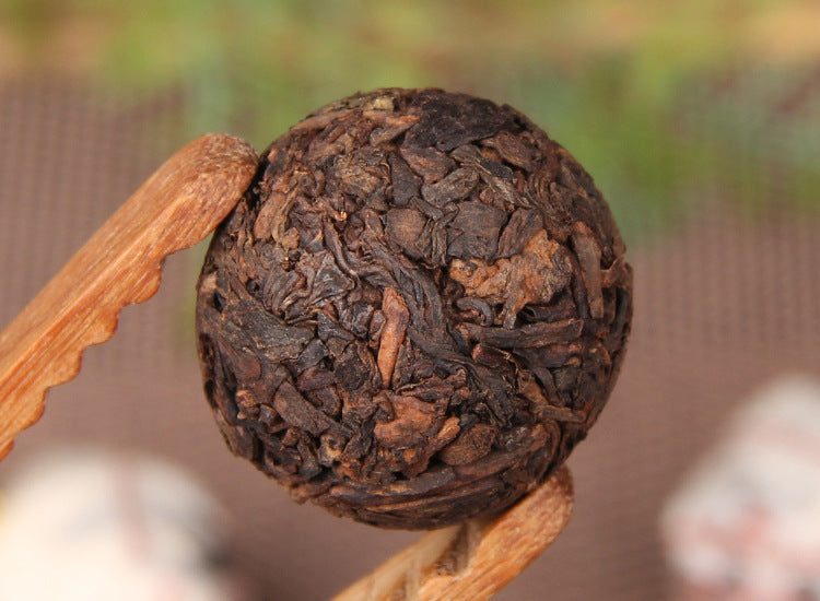 Jingmai ripe Pu-erh dragon pearl tea product image