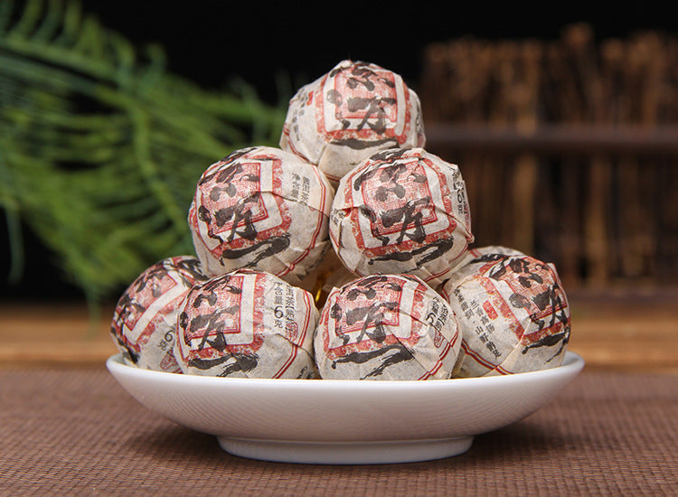 Jingmai ripe Pu-erh dragon pearl tea lifestyle image