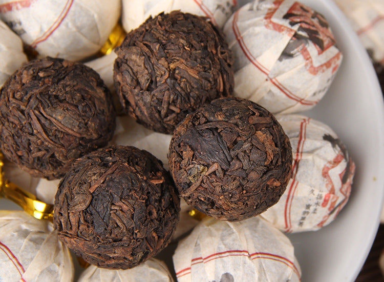 Yiwu ripe Pu-erh dragon pearl wrapper detail