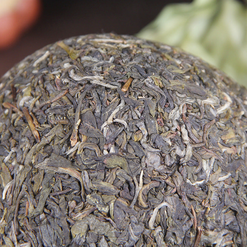 Close-up leaf texture of 2021 Yiwu Bohetang raw Pu-erh compressed tea