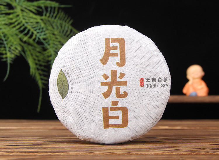 2022 Yunnan Moonlight White tea cake 100g wrapped front 月光白 白茶饼