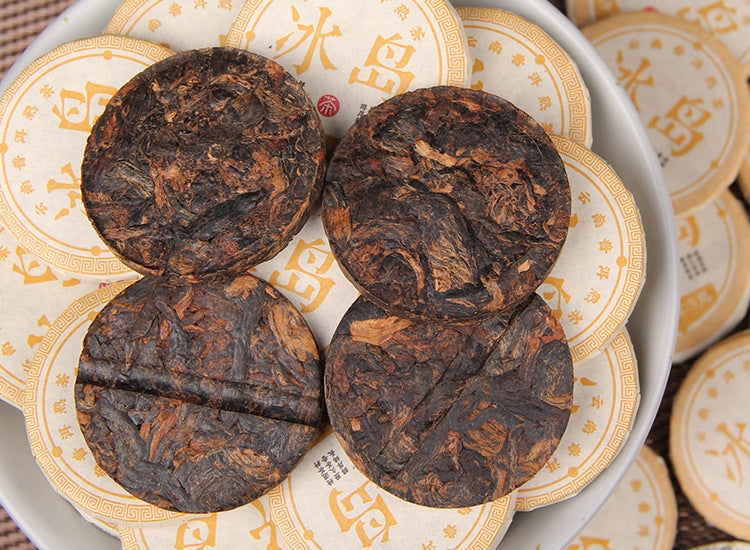 Bingdao golden-bud ripe Pu-erh mini cake detail