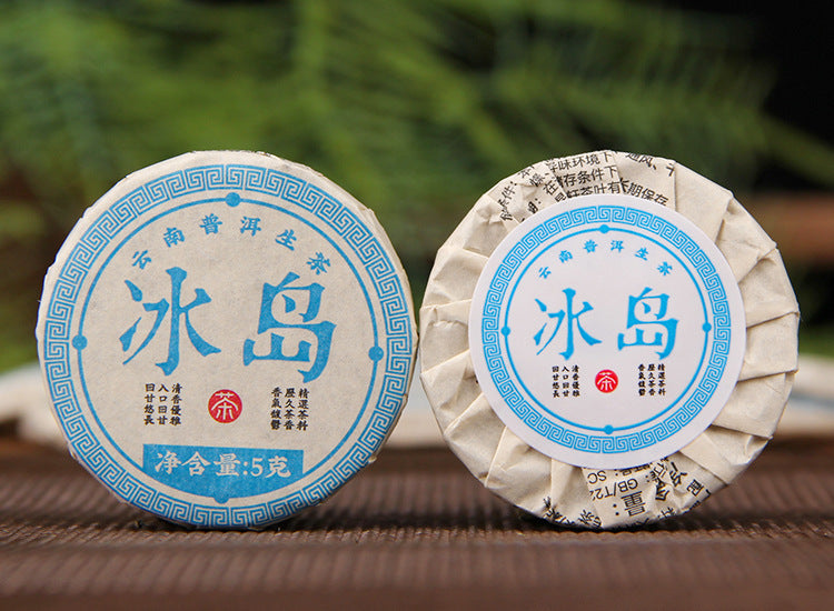 Xiaobingdao sweet raw Pu-erh mini cake with intact tea leaf material