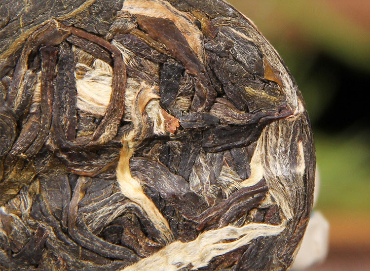 2023 Bingdao sweet raw Pu-erh mini cakes showing individually portioned 5g tea