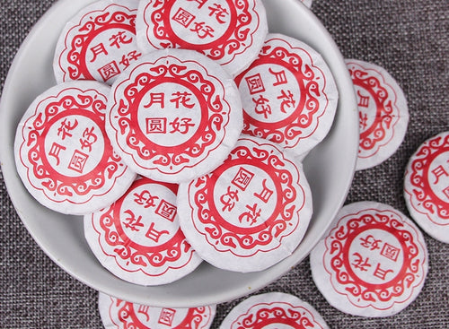 Huahao Yueyuan individually wrapped raw Pu-erh mini cakes