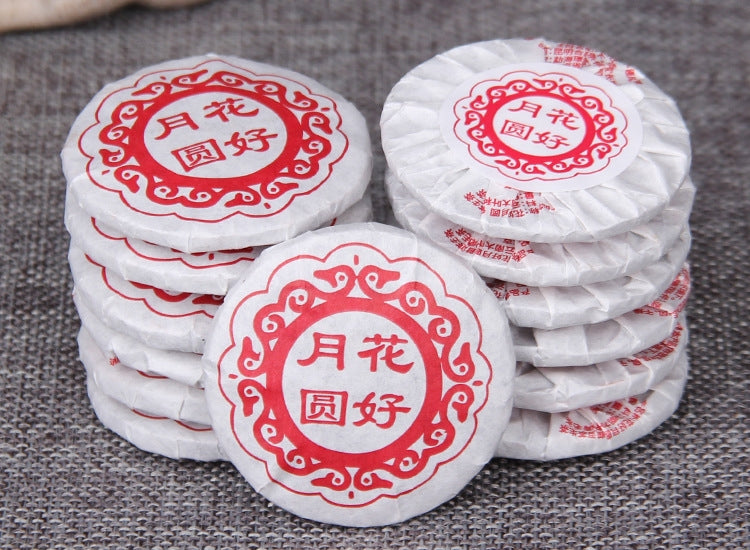 Daxueshan raw Pu-erh mini cake wrapper detail