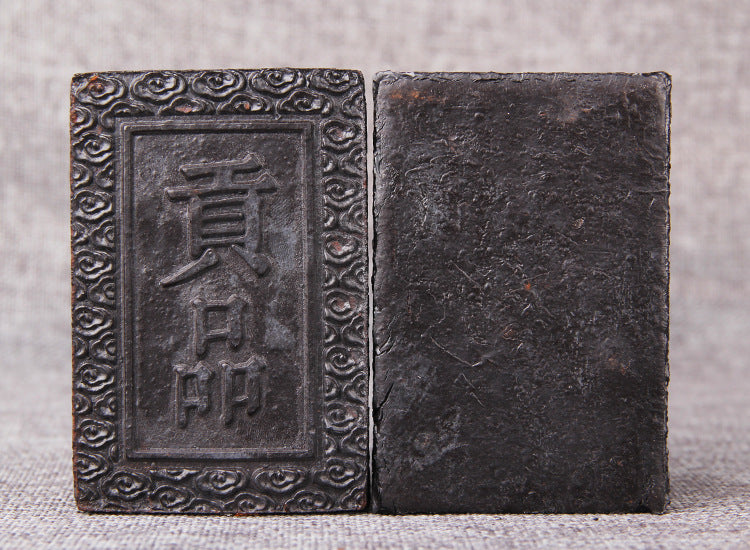 Front and back view of 100g Gongpin instant soluble ripe Pu-erh tea paste brick