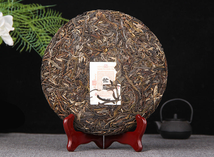 Reverse side of 2025 Mangfei raw Pu-erh 357g tea cake with inner label