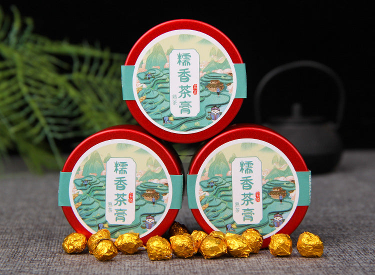 Sticky Rice Aroma Ripe Pu-erh Tea Paste red tins with gold-wrapped pellets 糯香熟茶膏