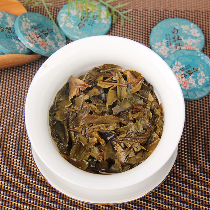 Brewed leaves from 2025 Yunnan Bai Mudan white tea mini cakes