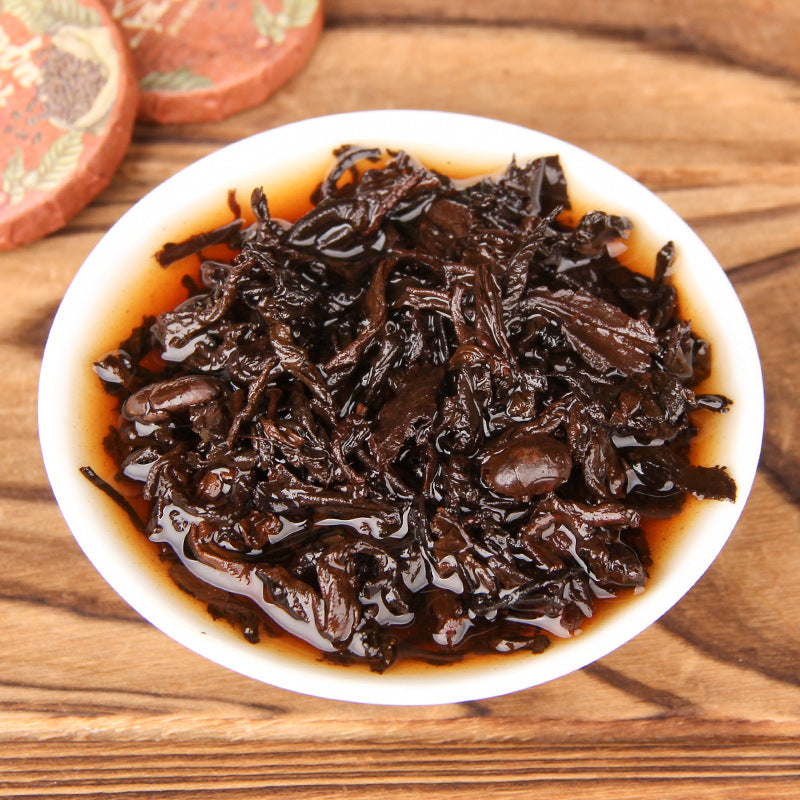 Brewed leaves from 2025 Yunnan coffee aroma ripe Pu-erh mini tea cakes