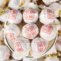 2026 Yunnan wild-mountain sun-dried Dianhong black tea dragon pearls in white wrappers