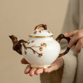 Handcrafted Dehua Mutton Fat Jade White Porcelain Sculpted Blossom Teapot - 200ml Gongfu Teapot