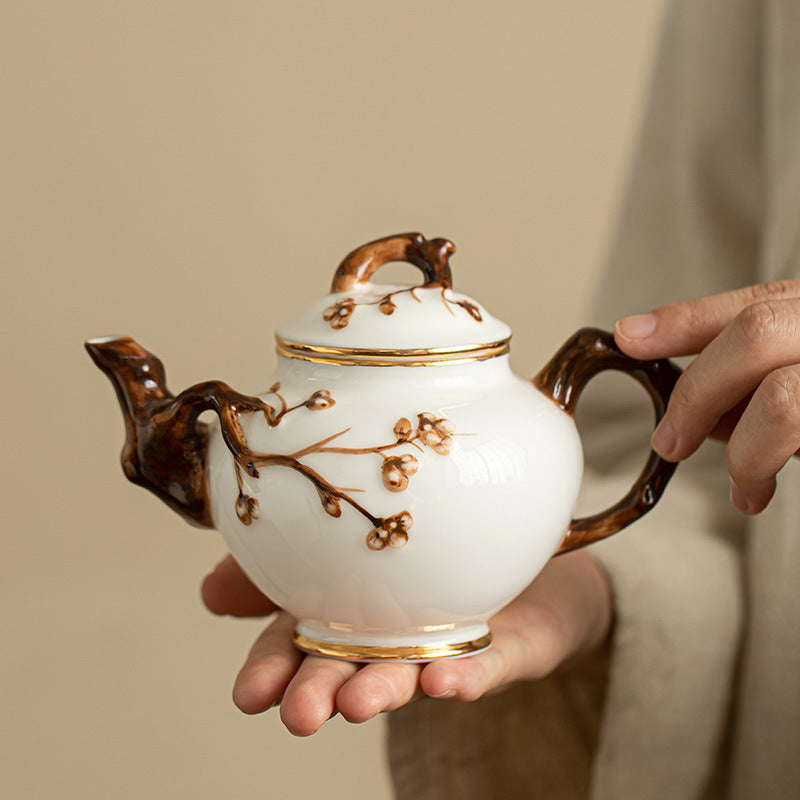 Handcrafted Dehua Mutton Fat Jade White Porcelain Sculpted Blossom Teapot - 200ml Gongfu Teapot