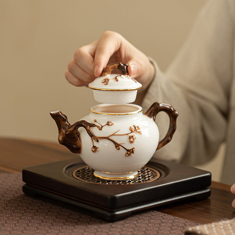 Handcrafted Dehua Mutton Fat Jade White Porcelain Sculpted Blossom Teapot - 200ml Gongfu Teapot