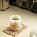 Luxury Dehua Mutton-Fat Jade Ice Biscuit 24K Gold Mountain Archer's Ring Teacup - 80ml Master Cup