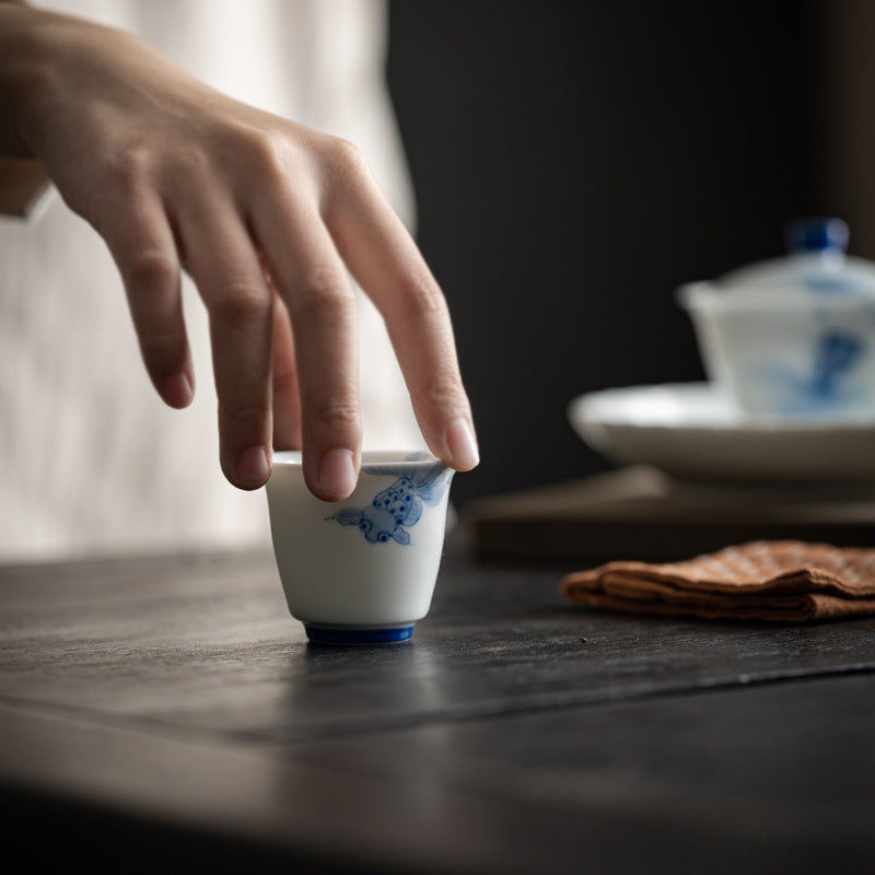 Authentic High-White Porcelain Underglaze Swimming Koi Master Teacup - 85ml Gongfu Cup