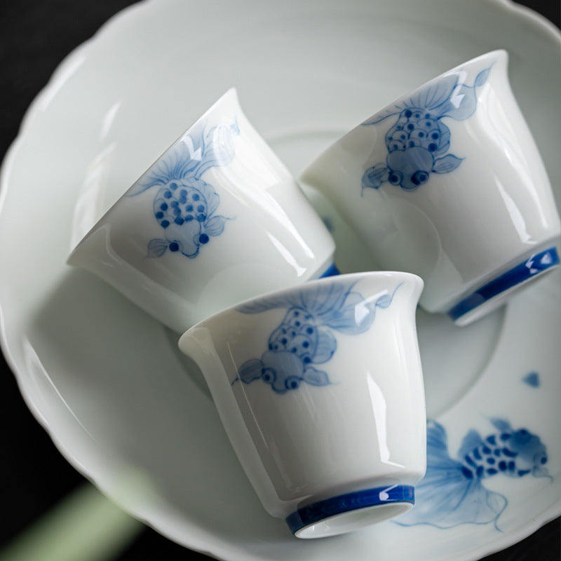 Authentic High-White Porcelain Underglaze Swimming Koi Master Teacup - 85ml Gongfu Cup